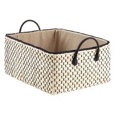 two baskets with handles are stacked on top of each other, one is white and the other is black