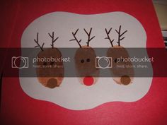 three reindeers on a red and white background