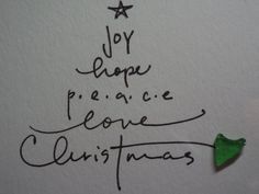 a piece of paper with the words joy, peace, and christmas written on it