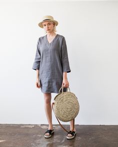 "Easy as a Sunday morning loose linen tunic in a mysterious Dim Gray color. Tailored from Lithuanian softened linen fabric it has a V neck, 3/4 sleeves and comfortable side pockets. Ideal clothing piece for your weekend relaxation. FABRIC: 100% Laundered Lithuanian Linen COLOR: Please choose the color on the side menu. STYLE: Loose linen V neck tunic dress with 3/4 sleeves and handy side pockets. SIZE CHART: XS Bust 28- 31\" (72- 79 cm) Waist 20- 22.5\" (51- 58 cm) Hips 31.5 -34.5\" (80- 87 cm) V Neck Tunic, Sleeveless Linen Dress, Linen Tunic Dress, Linen Crop Top, Linen Shift Dress, Dim Gray, Linen Crops, Linen Casual, Linen Tunic