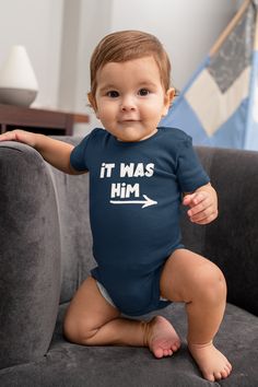 IT WAS HIM Matching brothers set 2 Piece Set:1 It Was Him Baby Romper1 It Was Him T-Shirt Get ready for double the fun with our Matching Brothers Set! This adorable duo features navy blue shirts with playful white text reading "IT WAS HIM" and arrows pointing to each other. Perfect for siblings, this humorous set makes a delightful gift for brothers. Made from soft, comfortable fabric, these shirts are ideal for everyday wear or special occasions. Celebrate brotherhood with a touch of humor and style! Playful Short Sleeve Onesie For Gender Reveal, Funny Short Sleeve Onesie For Gender Reveal, Cotton Onesie For Father's Day, Family Matching Short Sleeve Bodysuit For First Birthday, Short Sleeve Onesie With Graphic Print For Gender Reveal, Blue Cotton T-shirt For First Birthday, Funny Short Sleeve Onesie, Father's Day Casual Short Sleeve Onesie, Family Matching Short Sleeve Onesie For First Birthday