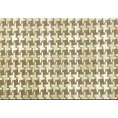 a brown and white checkered pattern on fabric