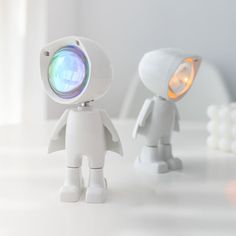 HIGH-TECH SUNSET LAMP AND DURABLE Creative robot figure can be used as a room decoration. Made of high-quality ABS materials and energy-efficient led light, which ensures fast heat dissipation, Sunset projection lamp has a stable quality and a longer service life. All our products are tested for the absolute highest quality and safety standards. 360 Degree Rotation Different from the general 90/180-degree rotation, the neck magnetic buckle design makes the romantic visual led light head can be r Robot Lamp, Room Background, Romantic Mood