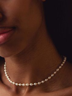 This pearl necklace features oval-shaped pearls interspersed by polished nuggets and sits close to the neck in a choker style for a different take on classic pearls. The necklace can be adjusted in length for the perfect fit. Oval Pearls Necklace, Classic Pearl Pendant Choker Necklace, Classic Pearl Chain Choker, Luxury Classic Pearl Choker Necklace, Classic Pearl Pendant Choker, Classic Pearl White Pearl Choker, Choker Style, Beaded Choker Necklace