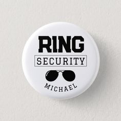 a white button with the words ring security michael on it