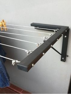 clothes hangers are attached to the wall