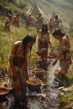 native american people gathering around a stream to drink water