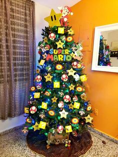 a christmas tree decorated with mario bros ornaments