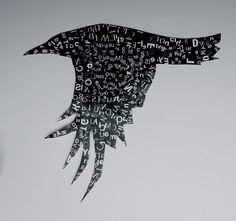 a bird made out of letters flying in the sky