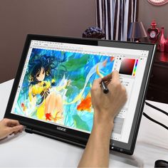 a person is drawing on a computer screen