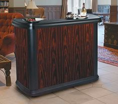 a large wooden bar sitting in the middle of a living room