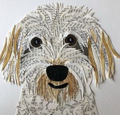 a dog made out of old book pages