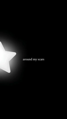 a white star with the words around my scars on it