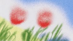 three red balls in the grass on a blue and white sky background with some green