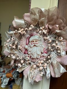 a wreath with a santa clause on it