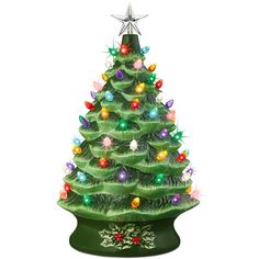 a green christmas tree with lights on it's top and an ornament in the shape of a star