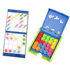 a box with some sort of colored blocks in it and a matching game on the side