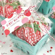 strawberries are wrapped in cellophane and tied with twine for a valentine's day treat