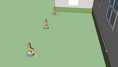 an animated view of some tools on the ground in front of a building with windows