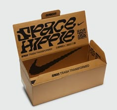 an open cardboard box with the word peace hippie printed in black on it's side