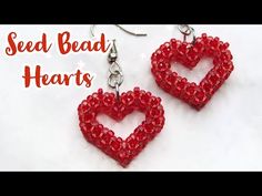 red beaded heart earrings on white background with the words seed bead hearts written below