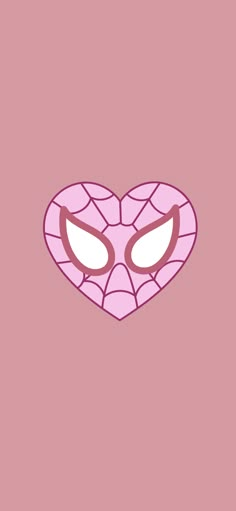 a pink heart shaped mask with eyes on it's face in the shape of a spider