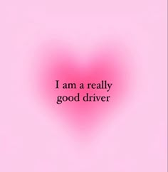 a pink heart with the words i am a really good driver