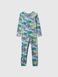 Soft cotton pajama top and pants set.  Crewneck.  Long sleeves.  Elasticized waist at PJ pants.  Allover dinosaur print.  Made with 100% organically grown cotton, which is better for people and the environment because it's grown without the use of harmful synthetic pesticides and fertilizers.  This product was made in a factory that invests in gender equality and women’s empowerment.  Through RISE Reimagining Industry to Support Equality) and Gap Inc. ’s program P. A. C. E.  Personal Advancement Kid Clothes, Which Is Better, Gender Equality, Top And Pants Set, Support People, Pj Pants, Sleepwear & Loungewear, Cotton Pyjamas, Pyjama Set