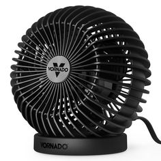 a black ventilator sitting on top of a white surface with the word vornado written on it