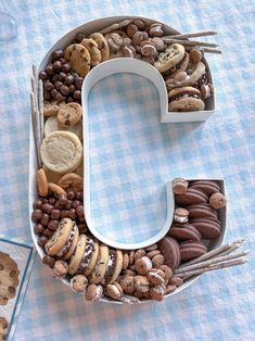 the letter c is made out of cookies and nuts