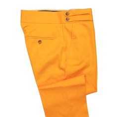 A must-have style in every man’s wardrobe, you will never look boring again with these solid trousers in orange. Elegantly made with high quality craftsmanship in a straight fit, flat-front style from premium quality cotton, these trousers feature a button and zip closure with a wide waistband with two extended fastening tabs. This pair of men's pants is perfect for work and everyday wear, business meetings, parties, gala dinners or summer weddings. Buy it for yourself, or gift it to a loved one for an anniversary, holiday, birthday or just because. Actual colors may vary. This is due to computer monitors displaying colors differently and everyone can see these colors differently. ABOUT: • Brand: Chiragh • Color: Orange • Features: Four pockets, cummerbund-style waistband • Fit: Slim strai Fitted Solid Color Cotton Dress Pants, Fitted Solid Cotton Dress Pants, Fitted Orange Pants For Formal Occasions, Solid Color Fitted Cotton Dress Pants, Formal Orange Pants For Spring, Formal Orange Trousers, Fitted Orange Formal Pants, Classic Fitted Chinos For Summer, Cotton Dress Pants With Straight Hem For Summer