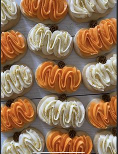 an assortment of decorated cookies sitting on top of a table