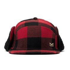 Melin LUMBERJACK Sherpa Lined Ear Flap Hat A WINTER WORKHORSE. Fit: Shallow Depth / Flat Bill Exterior Crown: Cotton flannel crown and snappable ear flaps with a custom-molded logo trim. Interior: Sherpa fleece lining for insulation and heat retention. Signature hidden besom pocket. Visor: Cotton flannel top visor. Brushed suede undervisor with signature thumbprint undervisor seal to prevent smudging. Closure: Genuine Nappa leather strapback with custom buckle closure. SKU: 1000000062-RDB-OSM Lumberjack Hat, Lumber Jack, Flap Hat, Ear Flap Hats, Bespoke Post, Flannel Tops, Strapback Hats, Ear Hats, Red And Black Plaid