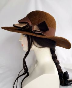 "ONE OF A KIND" Hand blocked mousseline millinery felt hat in fabulous boho style! Dramatic warm brown color and a texture that is so luscious and soft. It has a longer nap than most velour felts.  Oval crown with a bit of a bowler shape to it. Decorated with stunning vintage velvet ribbon that was Made in France. Lovely 4" sweeping brim.   Head size is 22"-22.5" Ships FREE UPS ground. This is a 25.00 savings! Fitted Brown Hat For Kentucky Derby, Vintage Fitted Felt Hat For Fall, Vintage Top Hat With Short Brim For Fall, Vintage Short Brim Top Hat For Fall, Vintage Fur Felt Fedora For Fall, Brown Curved Brim Top Hat For Kentucky Derby, Vintage Fur Felt Cloche Hat For Winter, Vintage Felt Hat For Fall Party, Vintage Felt Hat For Party In Fall