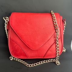 Danier Red Leather Bag, Leather Crossbody Bag, Red Leather Handbag,  8" width, 7" height.  In good vintage condition. Red Crossbody Flap Bag, Red Satchel Shoulder Bag For Evening, Red Satchel Bag For Evening, Red Evening Bag With Mobile Phone Holder, Red Flap Bag With Adjustable Strap For Evening, Vintage Red Rectangular Shoulder Bag, Chic Red Crossbody Clutch, Classic Red Flap Bag With Adjustable Strap, Red Crossbody Flap Bag For Travel