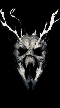 a black and white image of a demon with horns