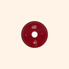 a red disc with the word act on it's front and back side, against a white background