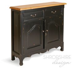 a black cabinet with two doors and drawers