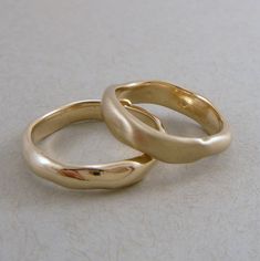 "Matching Wedding Ring Set, Golden Bronze Organic Ring, Rustic Wedding Ring Set, Bronze Wedding Set, Alternative Wedding Bands, Golden Bronze Ring, Organic Stackable Ring, Stacking Ring Hand formed with organic edge, the width varies and is about 1/4 inch wide Please leave me a note about the finish your desire, either High Shine or Matte ADDITIONAL INFORMATION: Every ring is handmade and is a \"one-of-a-kind\" and unique work of art. Each ring is unique and will be similar to the images but may vary slightly in width and pattern.   Many rings have their own character with organic edges, undulating surfaces and textures.   ABOUT BRONZE:   Bronze is an ancient metal and is composed of approximately 90% copper and 10% tin and not suitable to those with copper allergies as it may turn your fi Rustic Wedding Rings Set, Organic Wedding Ring, Matching Wedding Ring Sets, Rustic Wedding Ring, Stone Stacking, Bronze Wedding, Alternative Wedding Bands, Rustic Wedding Rings, Matching Wedding Rings