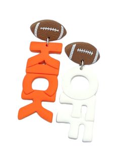 Score a style touchdown with our Kick Off Dangle Earrings! Made of clay, these quirky earrings are perfect for gameday and add a playful touch to any outfit. Get ready to kick off your game day look with these fun and unique earrings! Trucker Hat Fashion, Gameday Dress, Quirky Earrings, Heel Slippers, Bar Earrings, A Style, Sneaker Heels, Bow Headband, Unique Earrings