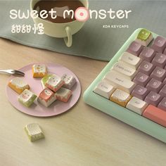 a keyboard and some small pieces of food on a plate