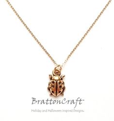 I love this Gold Ladybug Necklace! This is a TierraCast® original charm design. This super cute charm has detail on both side and is made in the USA using lead-free Britannia pewter with a nickel compliant 22k real gold plating. The charm is approximately 1/2 inches long and 3/8 inches wide. The 16 Ladybug Necklace, Ladybug Jewelry, Insect Necklace, Insect Jewelry, Cute Charms, Lady Bug, Gold Plated Sterling Silver, Real Gold, Spring Rings