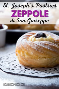 a close up of a doughnut on a doily with the words st joseph's pastries zeppole di san giuspepe