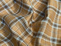 a brown and blue plaid fabric