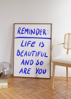 a framed sign that says reminder life is beautiful and so are you