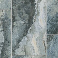 an image of marble tiles that look like they have been painted in grey and white