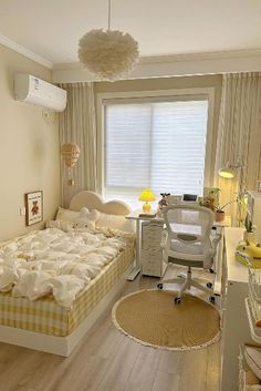 a bed room with a neatly made bed next to a computer desk and a window