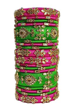 Silk Thread Bangles Heavy Kundan Meena Work  Color can be customized  Color:- Pink And Green Total Bangles:- 18 Bangles Festive Wedding Jewelry With Decorative Details, Festive Wedding Jewelry, Festive Decorative Wedding Jewelry, Adjustable Green Bangle For Wedding, Adjustable Green Wedding Bangle, Multicolor Beaded Bangle For Wedding, Multicolor Decorative Jewelry For Wedding, Bohemian Pink Bangle For Wedding, Pink Bohemian Bangle For Wedding