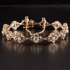 Vintage 1940's 14k Yellow Gold Diamond Clover Style Bracelet 1.56ctw 18.6g 7.5" Metal Information: 14k Yellow Gold Total Weight: 18.6g Bracelet Width: 9.3mm Bracelet Length: 7.5" Circa: 1940's Additional Information: Three Diamonds Are Modern Stone Information Main Stone Gem Type: Diamond Shape: Old European (5.1mm) Color: H Clarity/Quality: SI1 Carat Weight: .48ct Number of Stones: 1 Accent Stones Gem Type: Diamond Shape: Old European / Old Mine / Round (2.9mm - 2.75mm) Color: H Clarity/Quality: SI1 Carat Weight: .09ct Number of Stones: 12 Total estimated ctw (carat total weight): 1.56ctw Estimated Retail Price: $6090.00 OUR PRICE: $4870.00 45957 Vintage Bracelets Gold, Princess Jewelry, Wedding Jewelry Bracelets, Pretty Necklaces, Pretty Bracelets, Fancy Jewelry, Vintage Bracelets, Diamond Shape, Wedding Bracelet