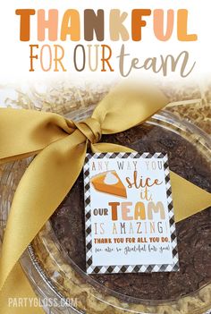 a thank you for our team card in a glass jar with yellow ribbon on top